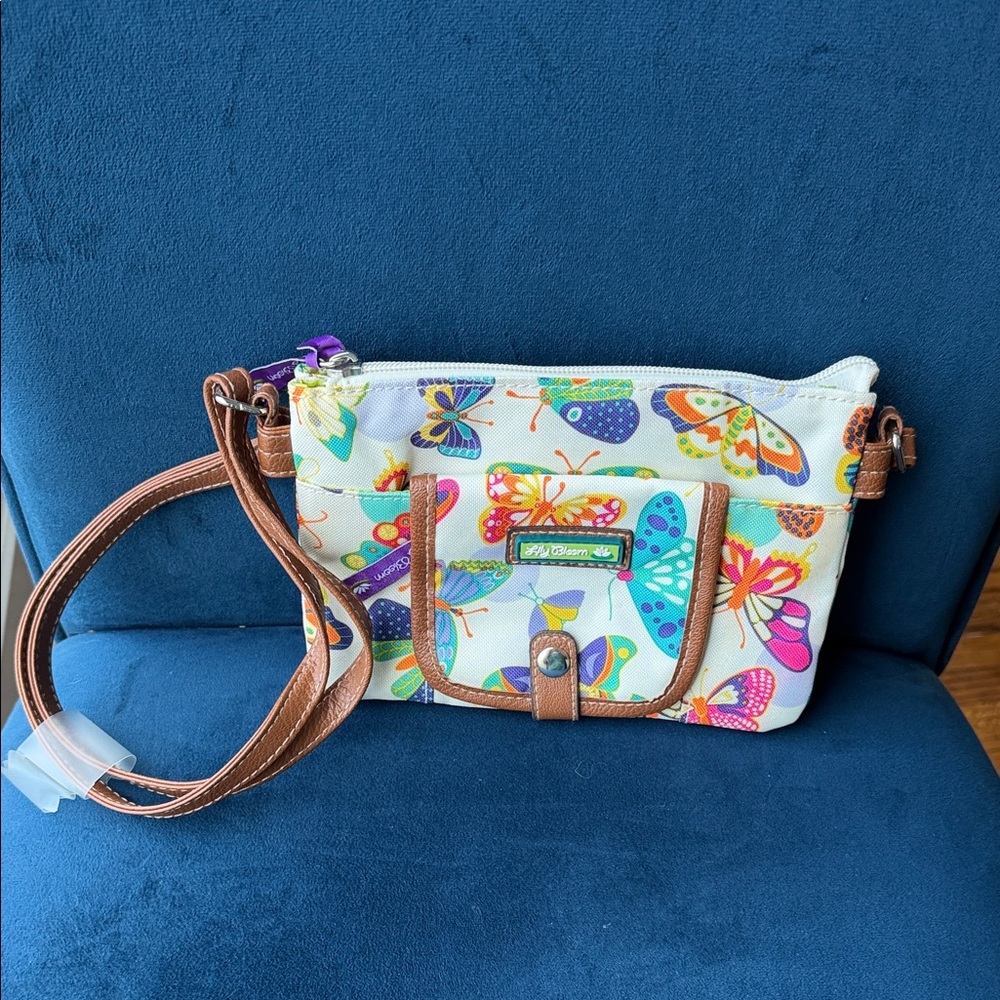 Lily Bloom White Crossbody Bag with Multicolor Butterfly Print and Brown Trim